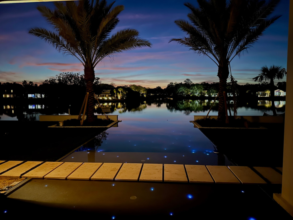 Zero Edge Pool with LED lighting at sunset in Jacksonville FL